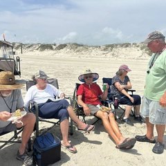 Guests at a resort potluck